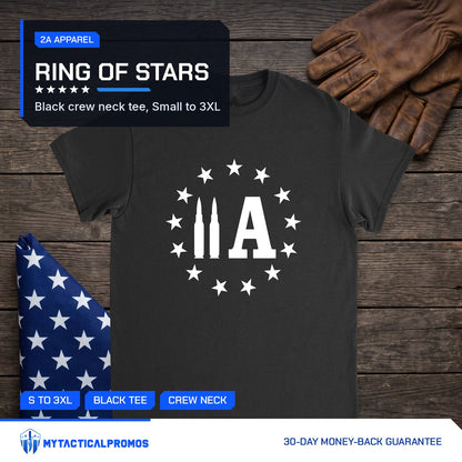 2A Bullet T-Shirt laid flat on a dark wood table with a folded flag