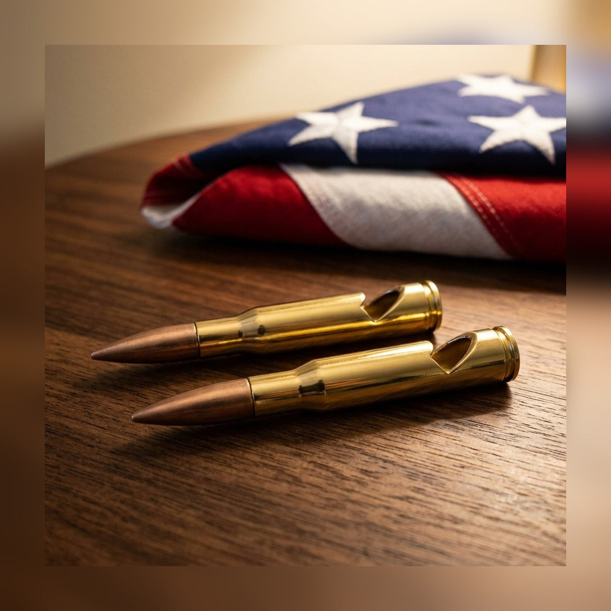 Two 50 Cal Bullet Bottle Openers in front of a folded American flag