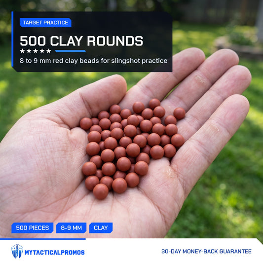 500 Clay Slingshot Beads held in an open palm over a backyard lawn