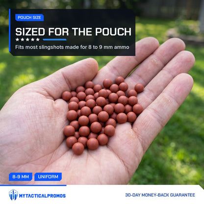Handful of 500 Clay Slingshot Beads showing the 8 to 9 mm size