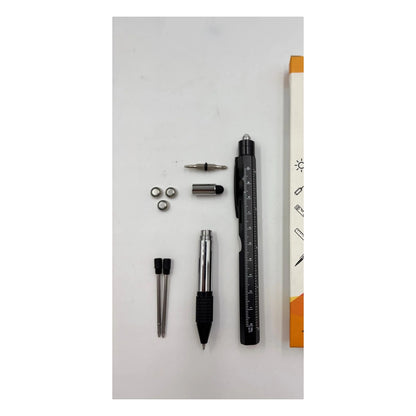 9-in-1 Multi-Tool Pen with its bits, stylus tip, spare refills and batteries laid out