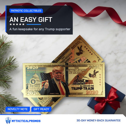 Trump Train 2020 gold foil novelty bills on marble with a gift box