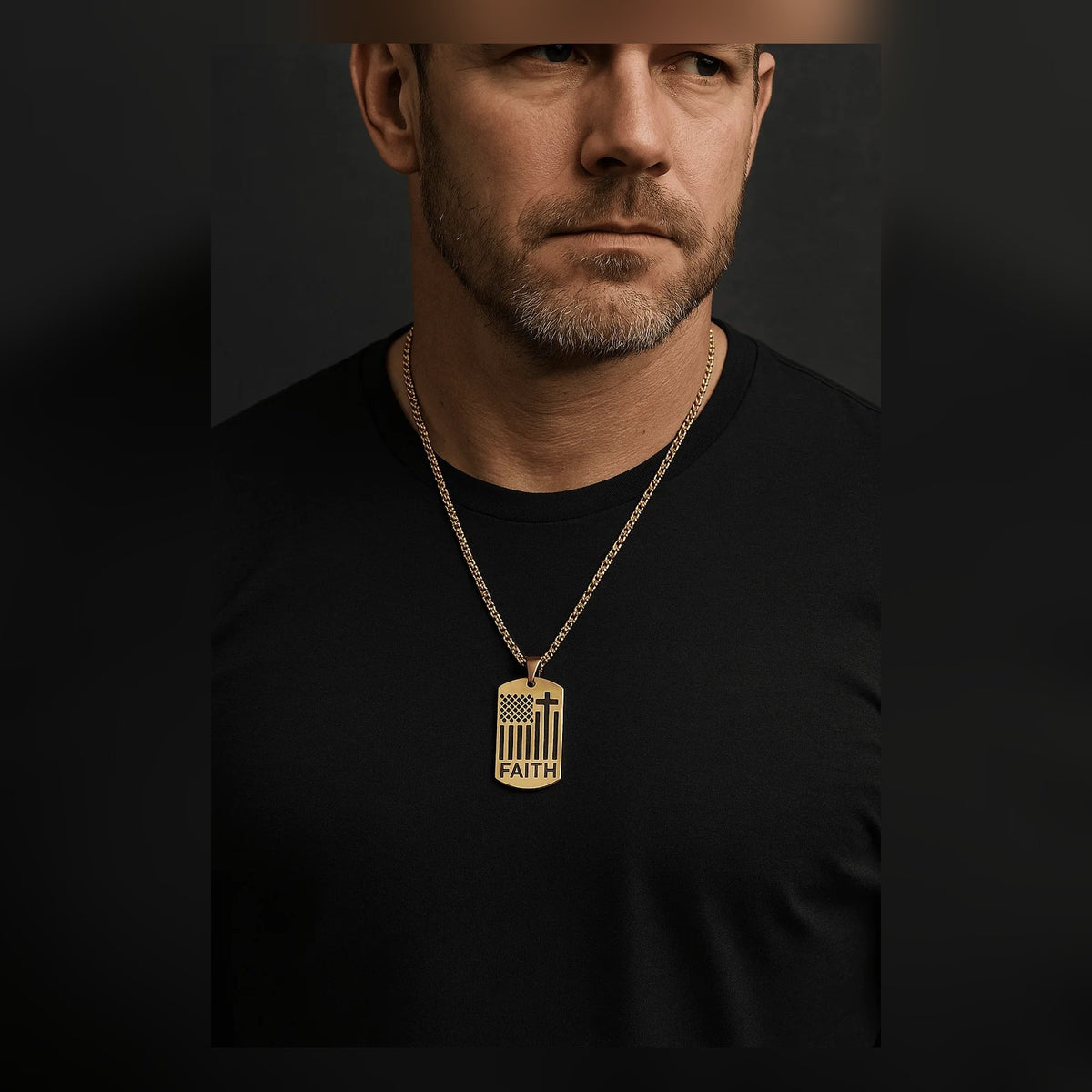 Man wearing the American Flag Cross Necklace over a black t-shirt