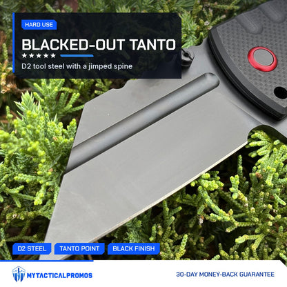 Black Vantage Knife close-up of the blacked-out D2 steel tanto point and jimped spine