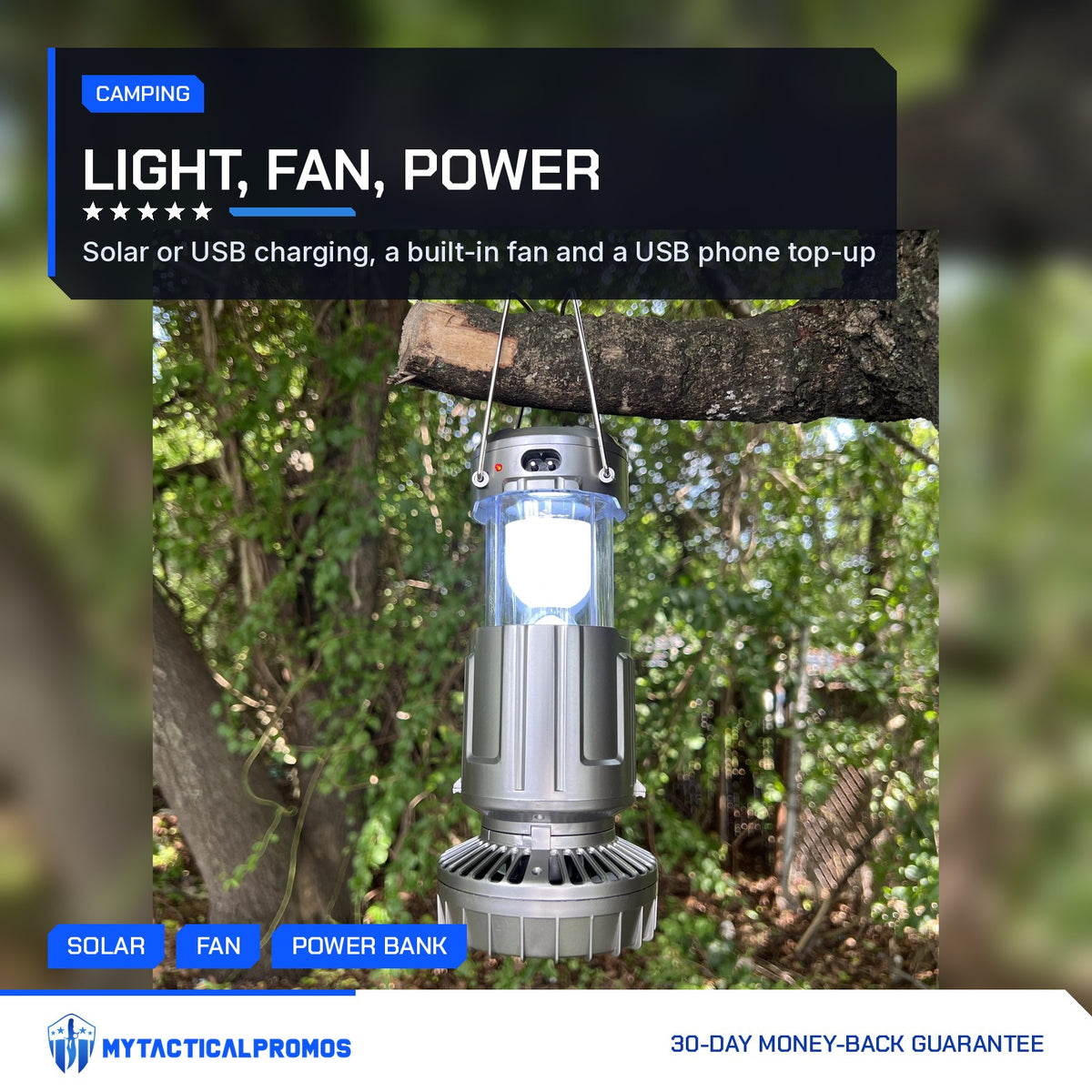 Solar Camping Lantern lit and hanging from a tree branch by its steel handles