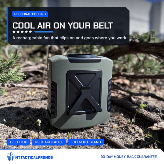 Clip-On Waist Fan in green and black sitting outdoors on the ground