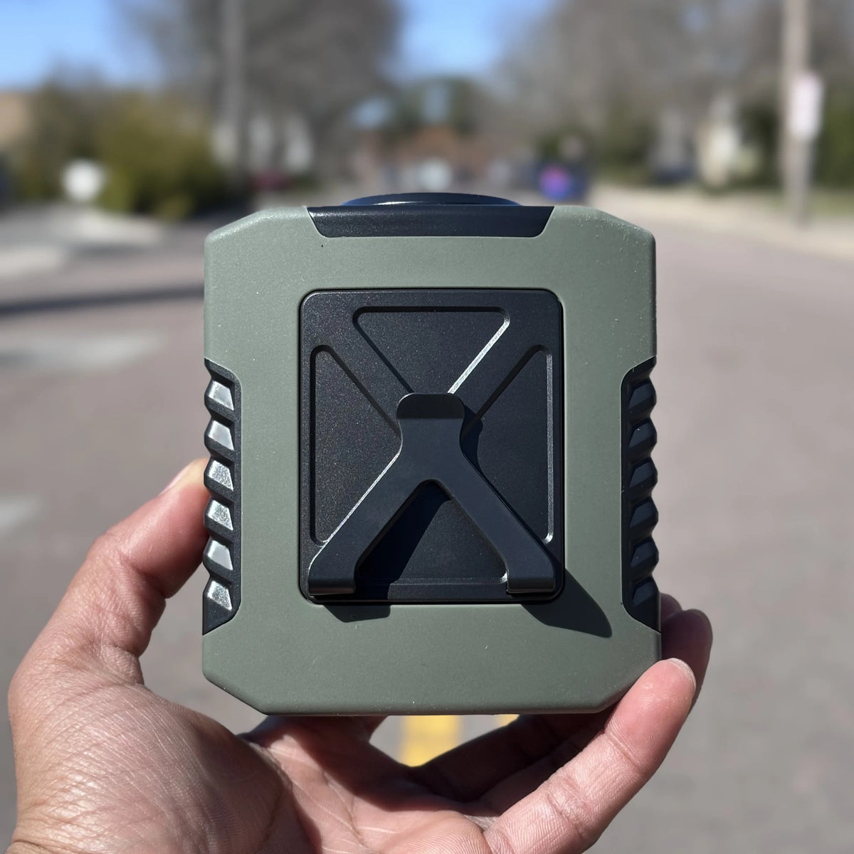 Clip-On Waist Fan front view held in hand outdoors