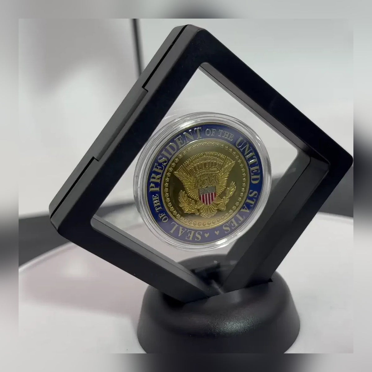 CoinSeal Floating Coin Display holding a presidential seal coin in its capsule