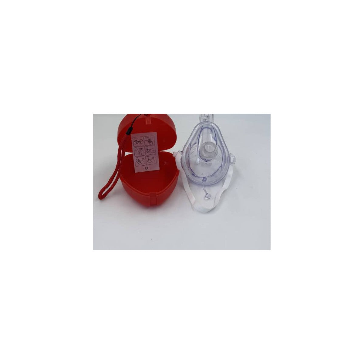 CPR Car Kit open red case with picture guide beside the clear mask and head strap