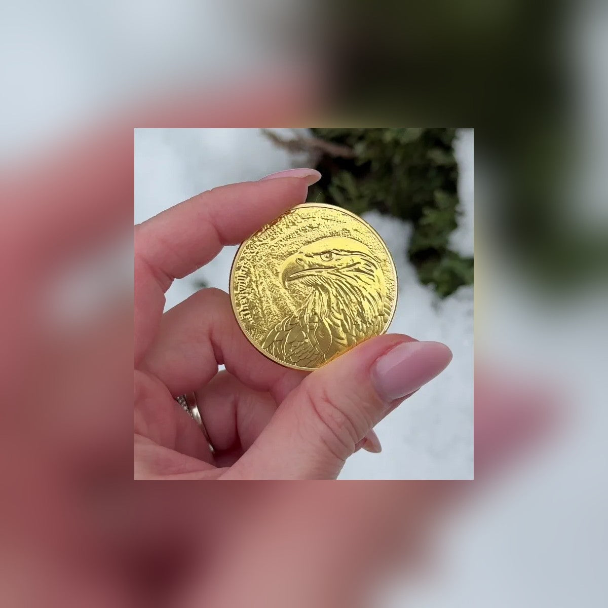 Isaiah 40:31 Eagle Coin held between fingers to show its size