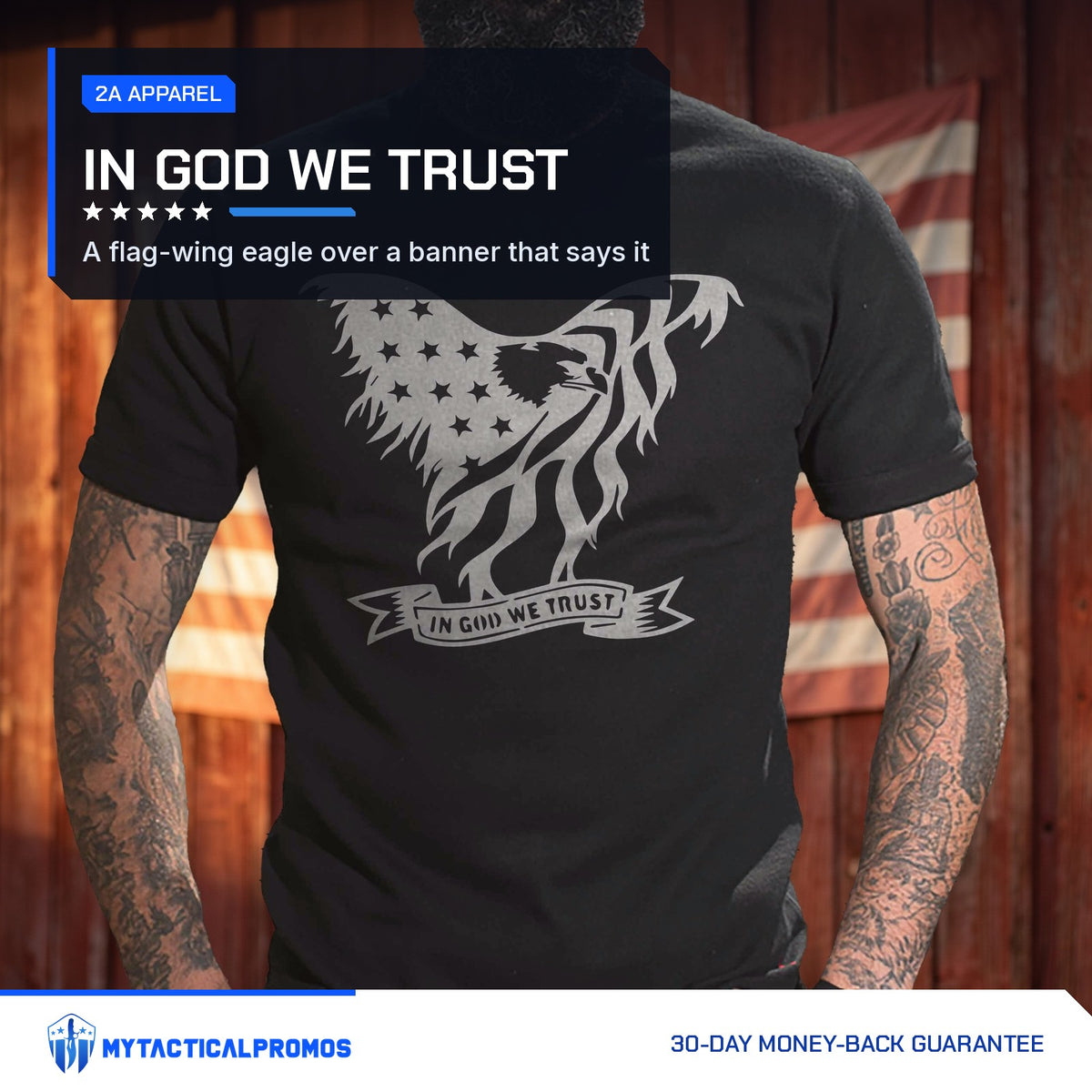 Eagle In God We Trust T-Shirt worn by a man in front of a red barn wall with an American flag