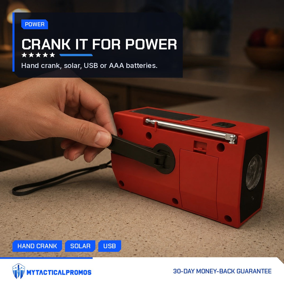 Hand turning the fold-out crank on the back of the Emergency Radio