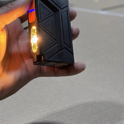 Flat Flashlight side light lit and held in one hand