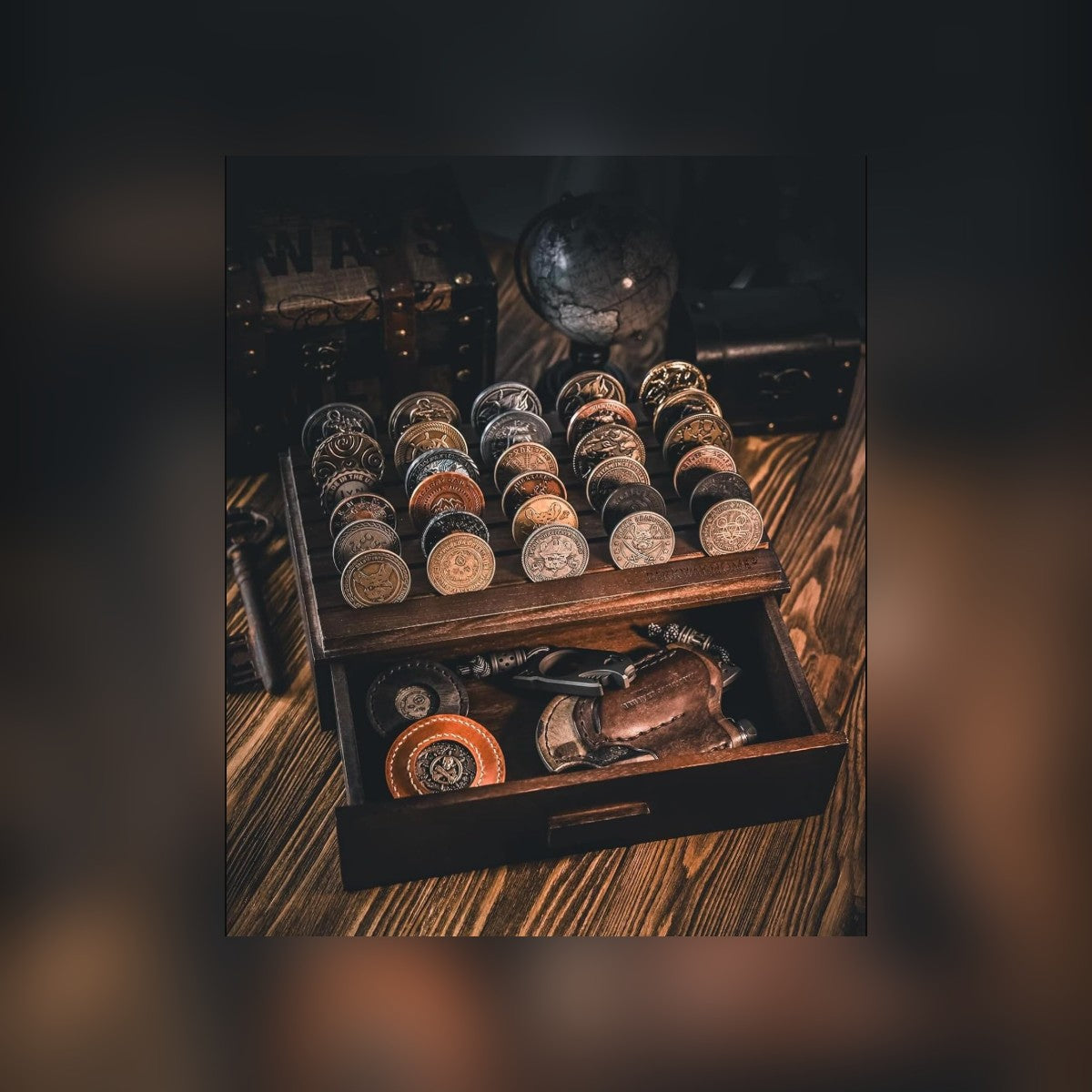 Glass Coin Case with the drawer open on a wooden desk in a study