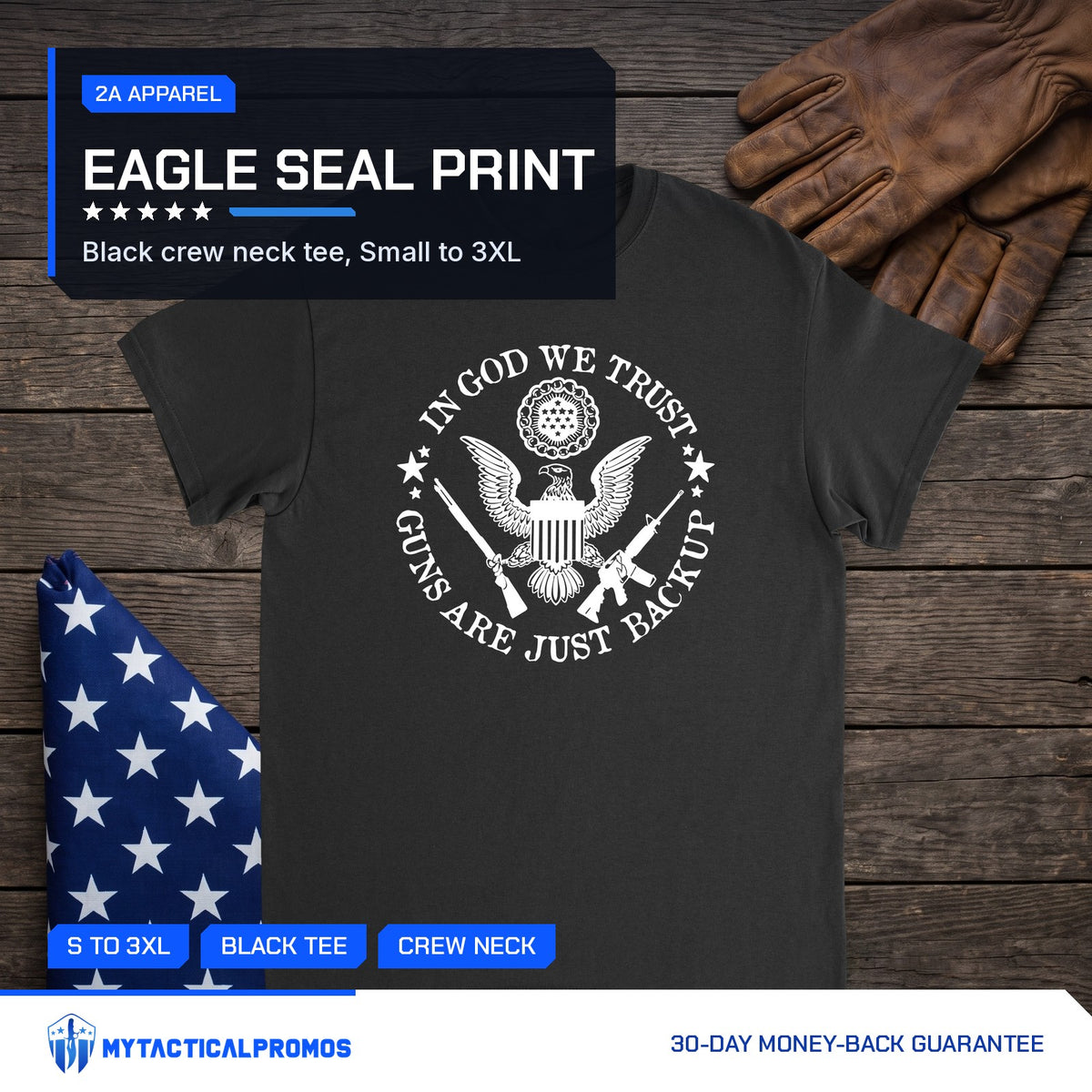 Guns Are Just Backup T-Shirt laid flat on a dark wood table with a folded flag
