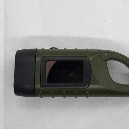 Hand Crank Flashlight top view with the solar panel, LED head and carabiner
