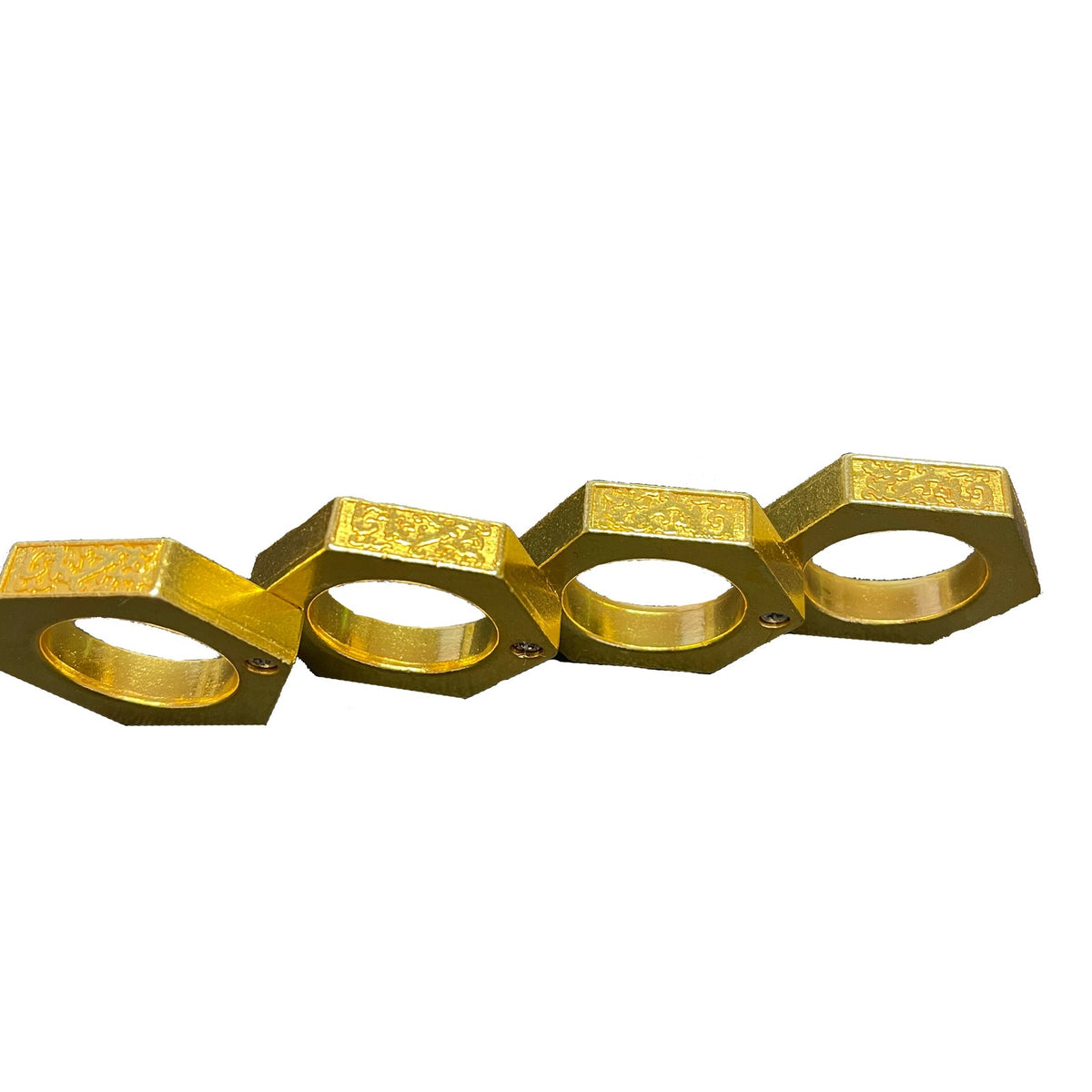 Knuckle Ring laid out as a row of four gold rings