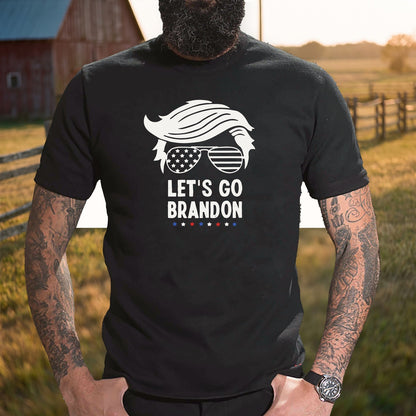 Let's Go Brandon T-Shirt worn by a ranch fence at golden hour