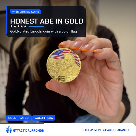 Abraham Lincoln Gold-Plated Coin held up in hand