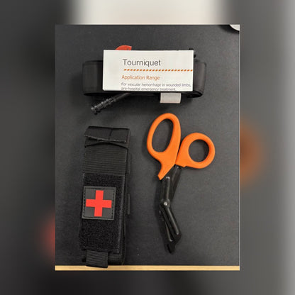 One-Arm Tourniquet Kit contents: tourniquet with instruction card, holster pouch and trauma shears