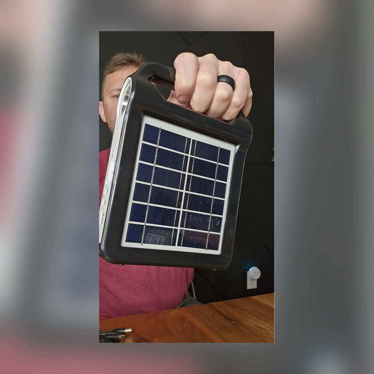 Hand holding the Portable Power Station by its built-in carry handle