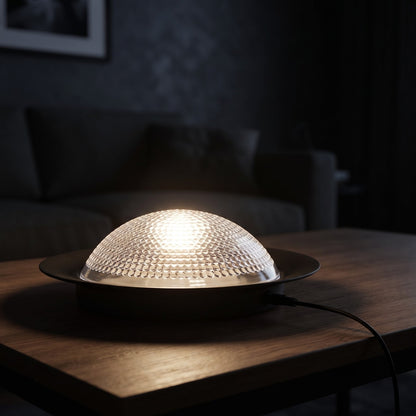 Power Station Light Bulb lighting a living room coffee table at night