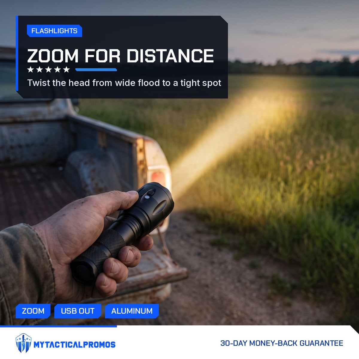 Powerbank Flashlight held at a truck tailgate, zoomed beam reaching across a field at dusk