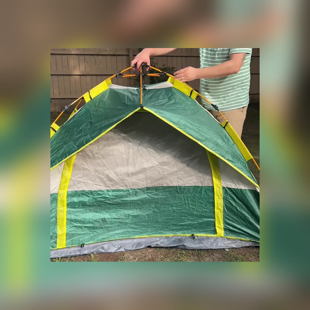 Two people lifting the pop-up frame of the Quick Popup Tent into place