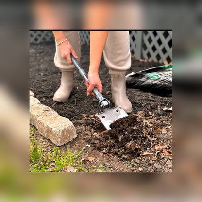 Woman digging a garden bed edge with the Compact Camp Shovel