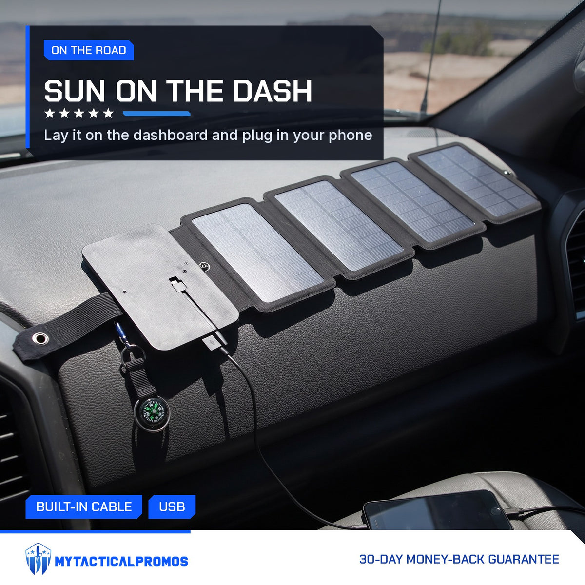 SolarFold solar charger unfolded on a truck dashboard charging a phone