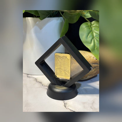 Statue of Liberty gold-plated bar in a floating display frame on marble