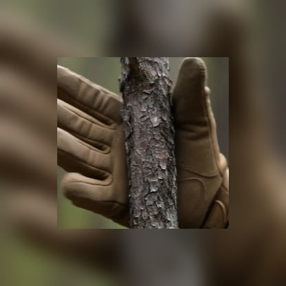 Gloved hand gripping a tree trunk in the Tactical Gloves
