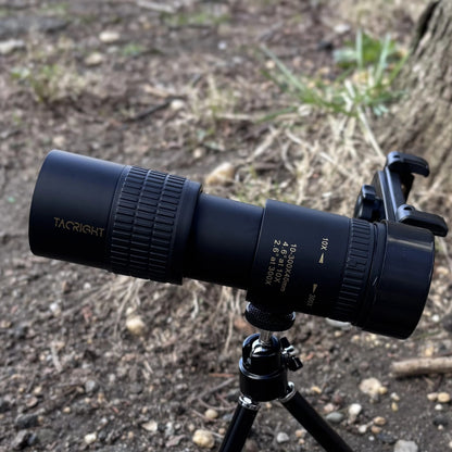 Zoom Monocular Telescope on its tripod with phone clip on a dirt trail
