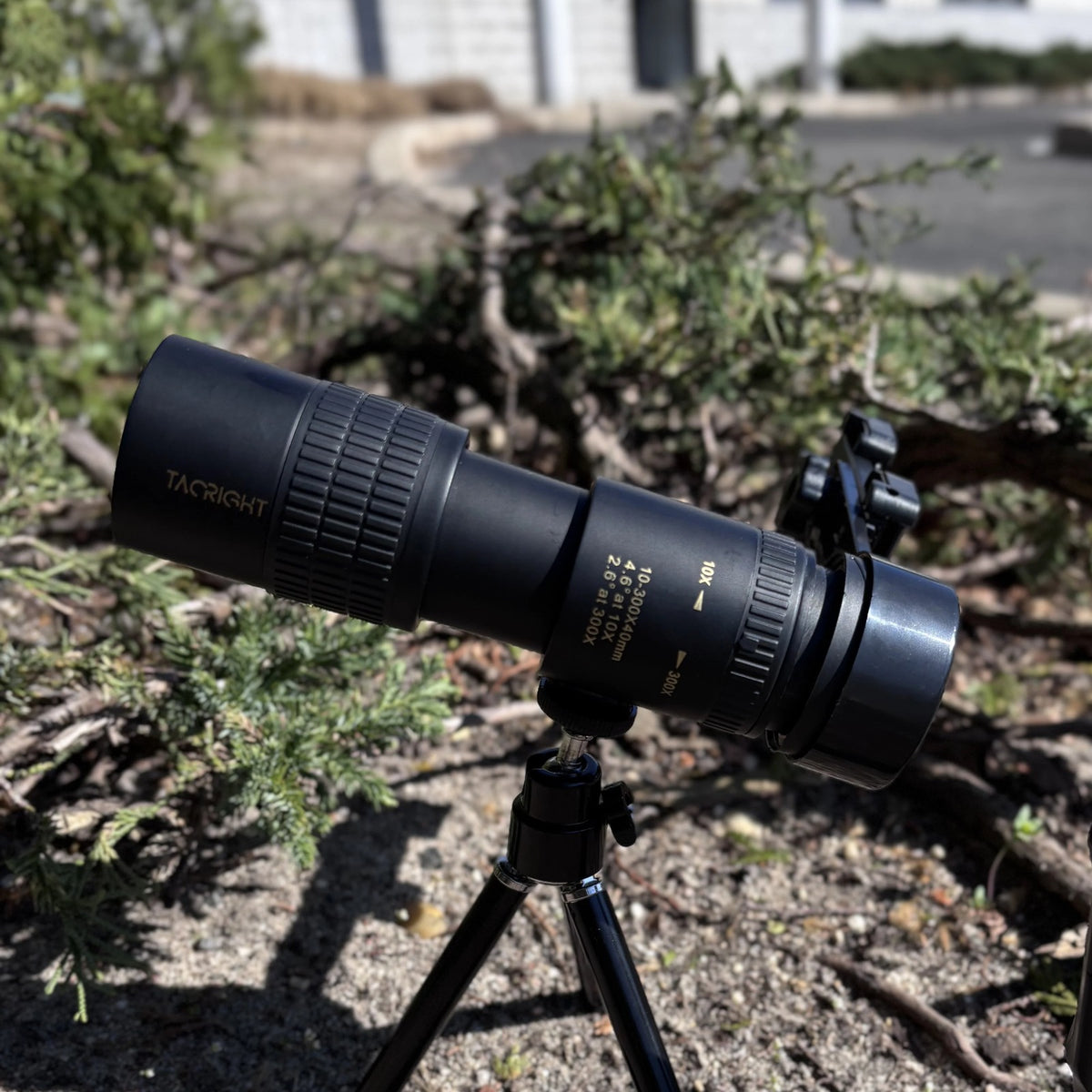 Zoom Monocular Telescope on its tripod in low brush outdoors