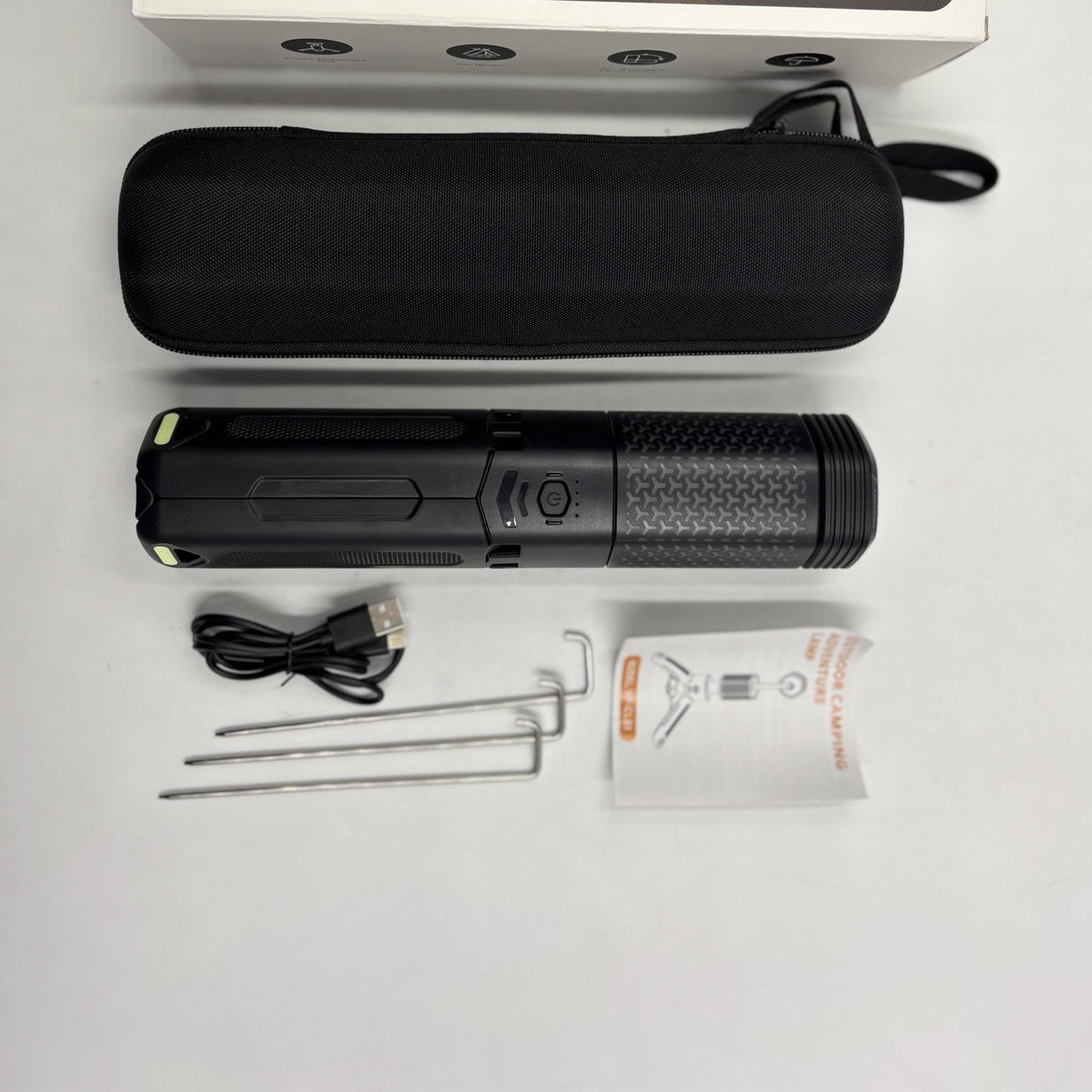 Telescoping Camping Lantern with its zip carry case, USB cable, ground stakes and manual
