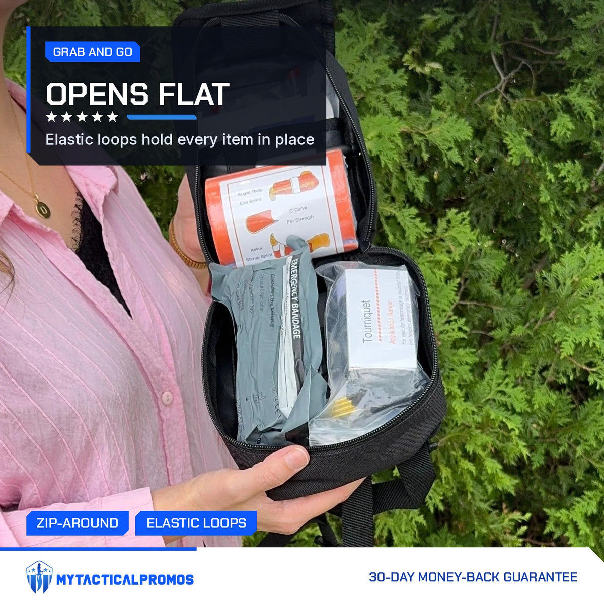 Trauma First Aid Kit unzipped flat with trauma bandage and tourniquet held in elastic loops