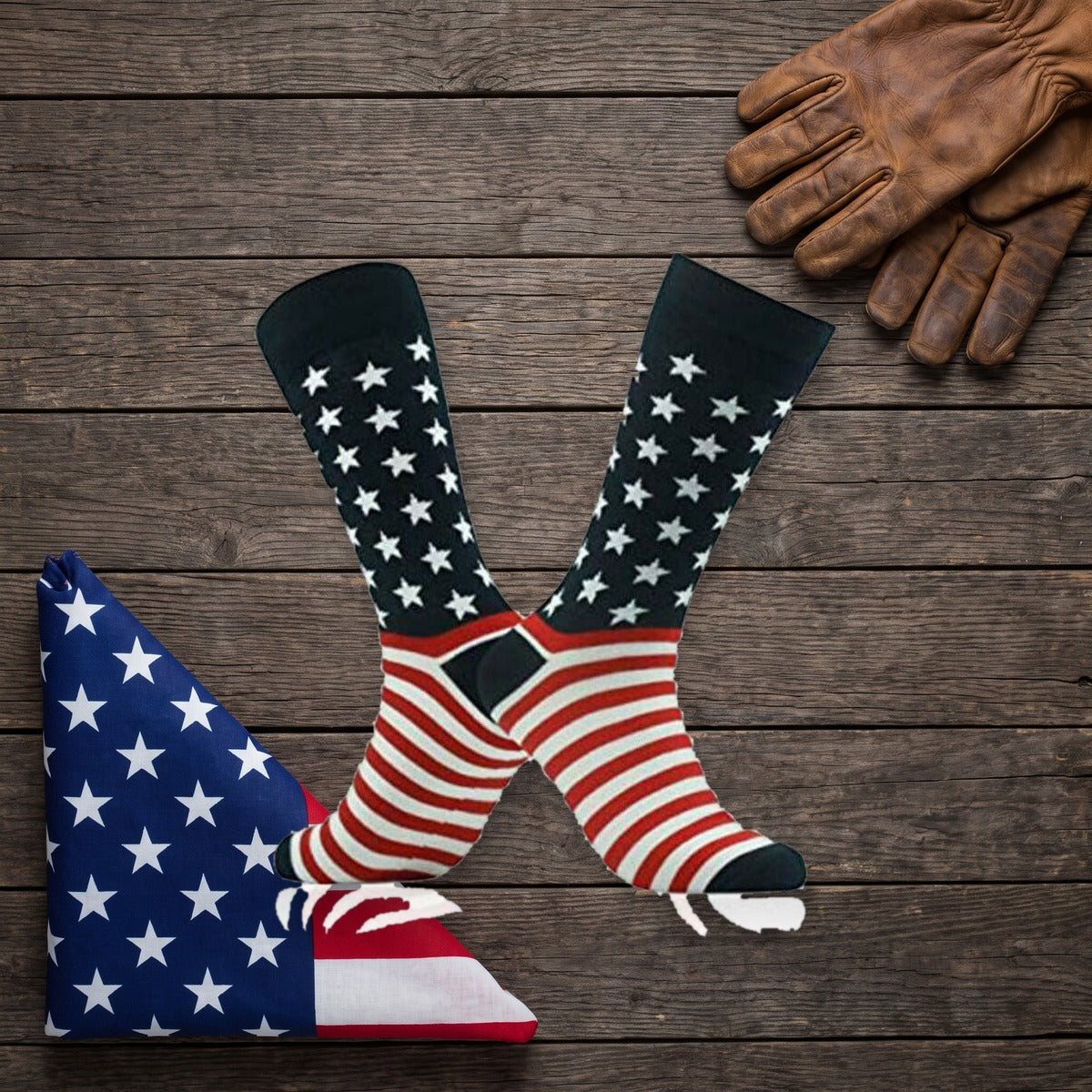 American Flag Socks crossed on a dark wood table beside a folded flag