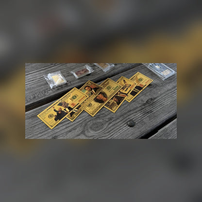 Trump July 13 commemorative gold foil bills spread on a picnic table, other keepsakes sold separately