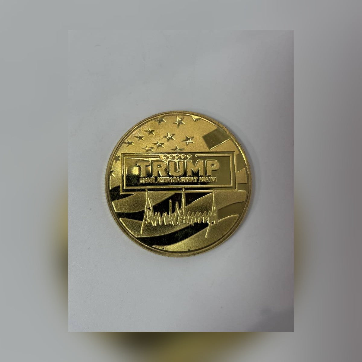 Trump July 13 Coin gold reverse: TRUMP, Make America Great Again and signature