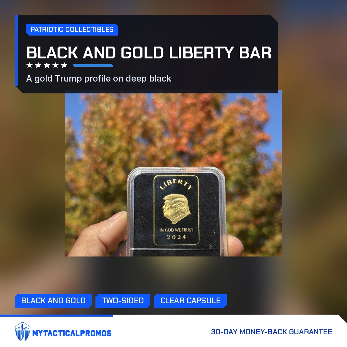 Trump Liberty 2024 black and gold bar in its clear capsule held up against autumn trees