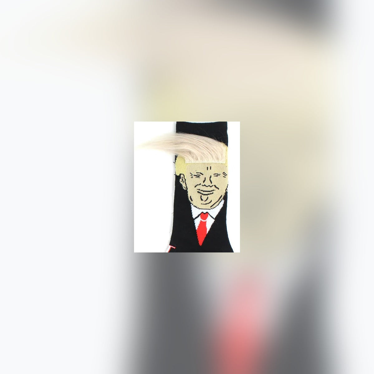 Trump Hair Socks close-up of the cartoon face and blond fabric hair tuft