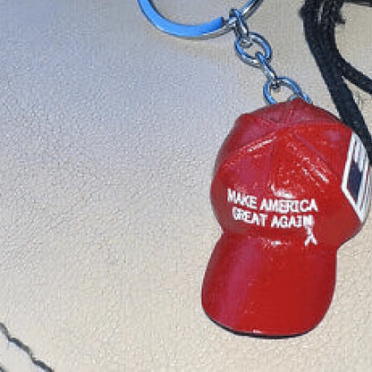 Trump MAGA Hat Keychain clipped onto a set of keys
