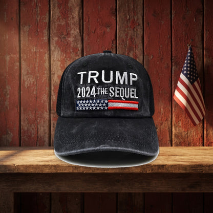 Trump 2024 The Sequel Hat on a rustic barn shelf with a small flag