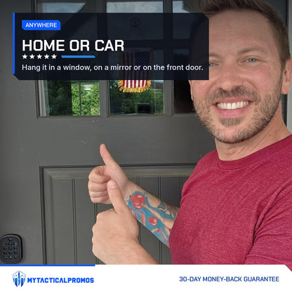 Man giving a thumbs up next to the USA Flag Mini Pennant hung in a front door window