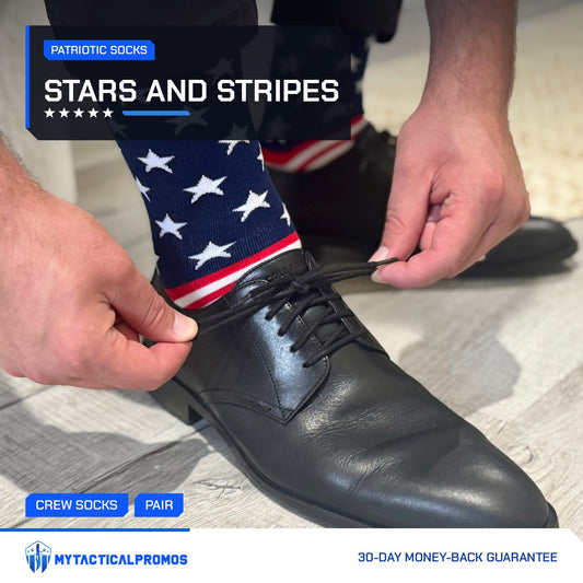Man tying a dress shoe while wearing USA Flag Socks