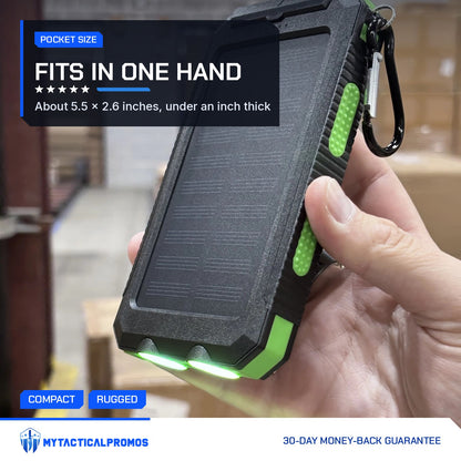 Hand holding the Waterproof Solar Charger with its twin LEDs on